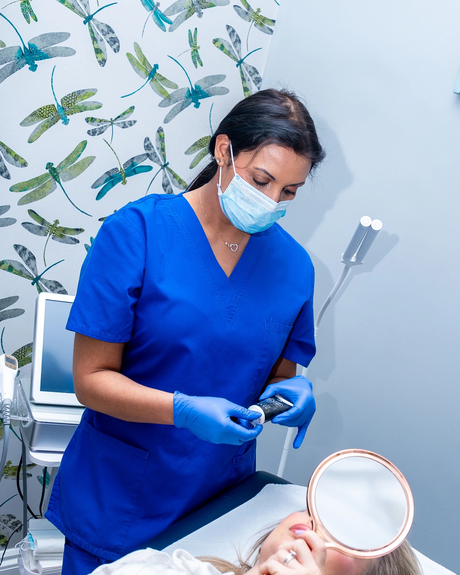 Dee Kaur performing a treatment at DK Aesthetics